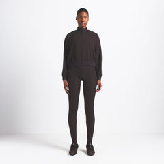 NikeSKIMS MATTE TRICOT TRACK JACKET | DARK ROAST ON A MODEL FRONT VIEW @ | FOCUS: 0.0, 1.0, 0.9