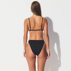 ICONIC SWIM TRIANGLE BIKINI TOP | OBSIDIAN ON A MODEL SIDE VIEW 