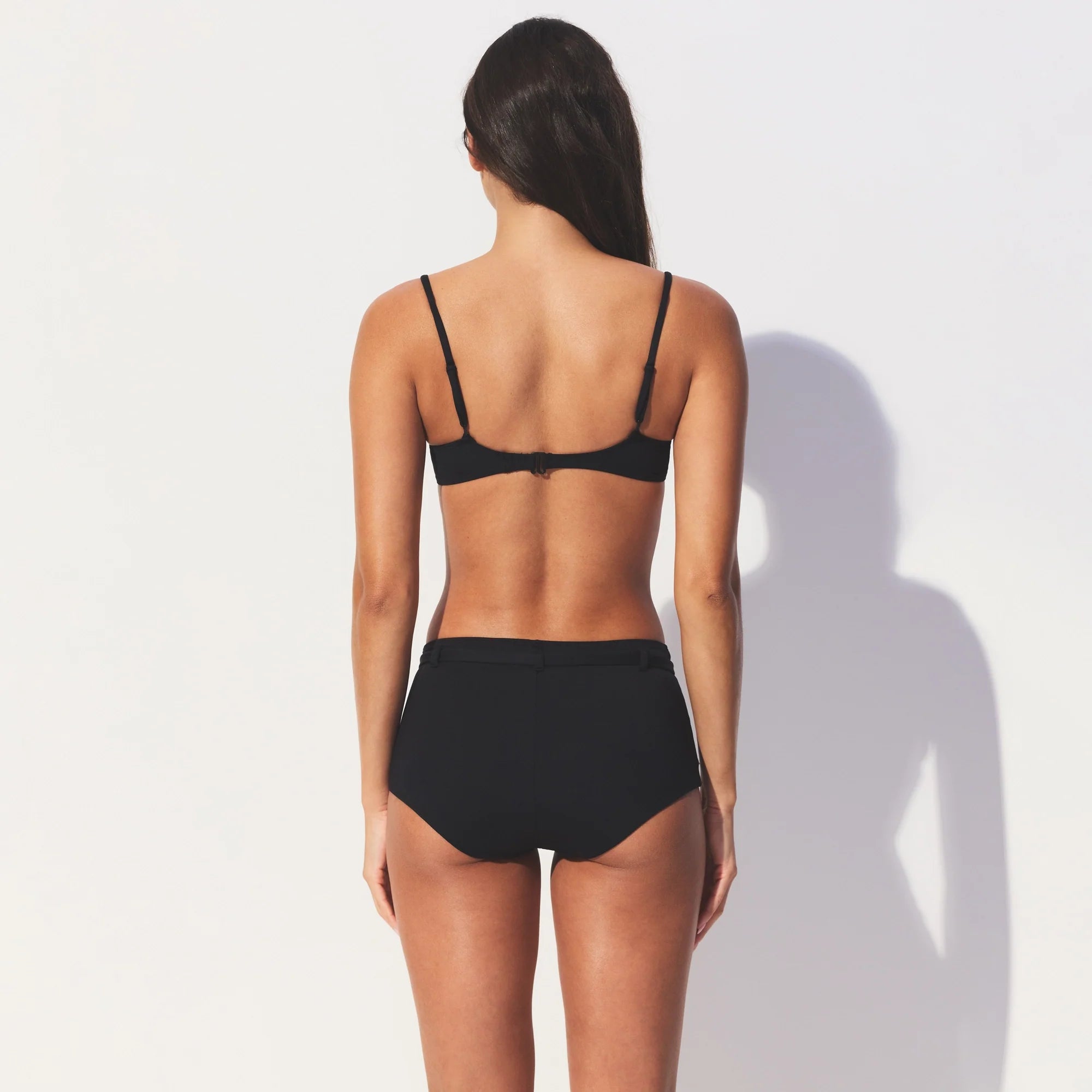 ICONIC SWIM UNDERWIRE DEMI BIKINI TOP | OBSIDIAN ON A MODEL SIDE VIEW 