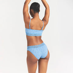 LIGHTWEIGHT COTTON WIDE LACE BRIEF | SURF DAINTY FLORAL PRINT ON A MODEL SIDE VIEW @ | FOCUS: 0.0, 1.0, 0.9