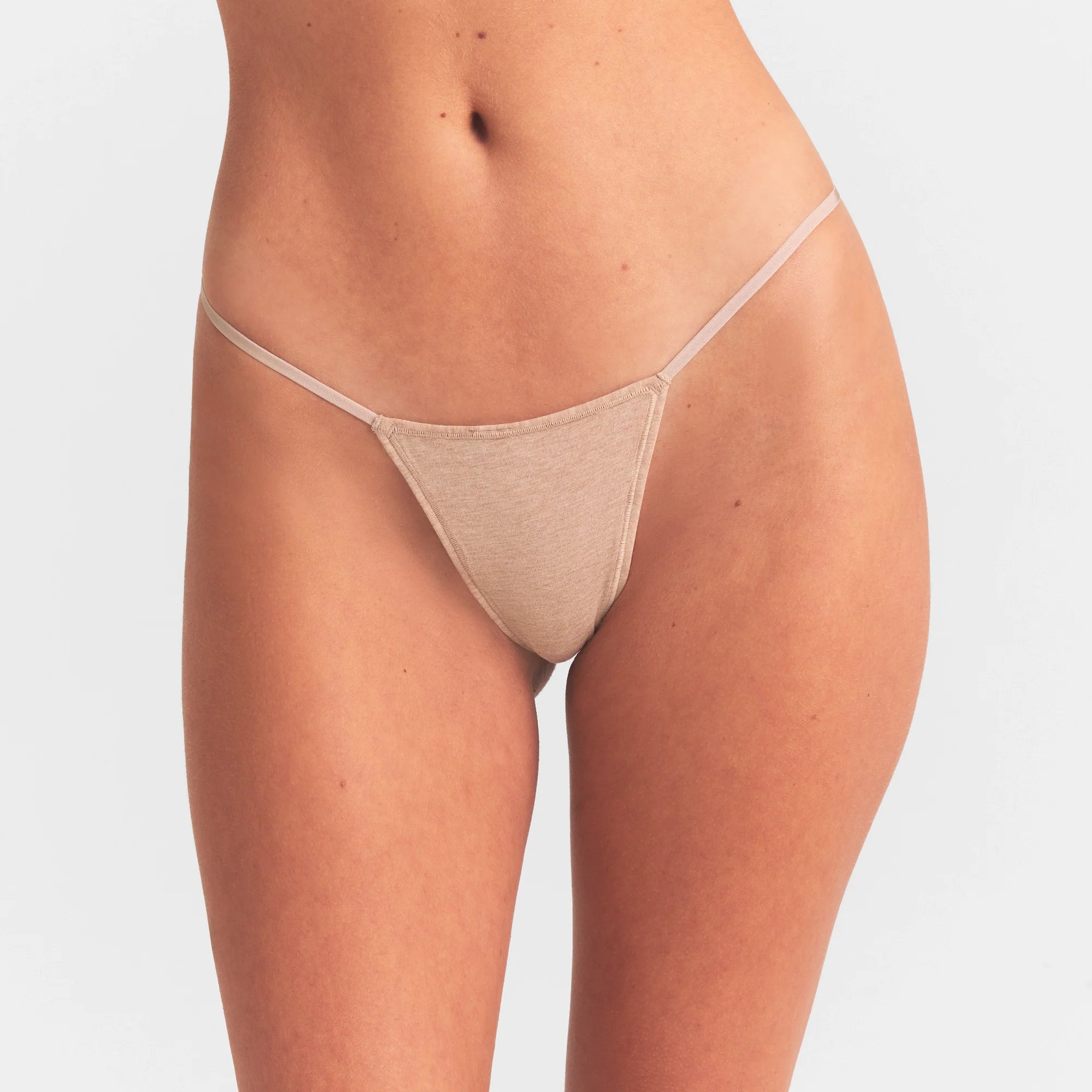 EVERYDAY COTTON STRING THONG | CLAY HEATHER ON A MODEL SIDE  VIEW @ | FOCUS: 0.0, 1.0, 0.9