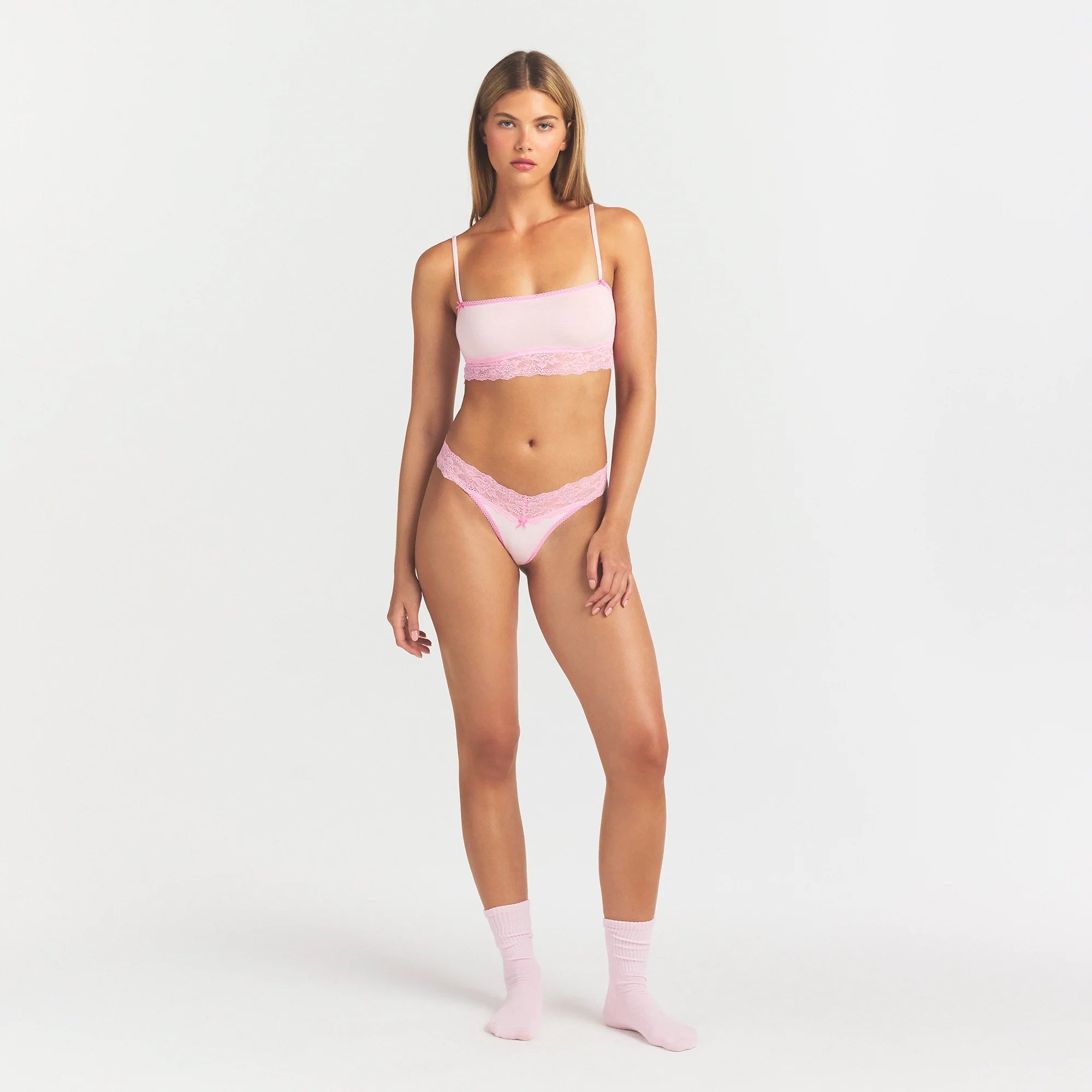 LIGHTWEIGHT COTTON WIDE LACE THONG | CHERRY BLOSSOM TONAL ON A MODEL FRONT VIEW @ | FOCUS: 0.0, 1.0, 0.9