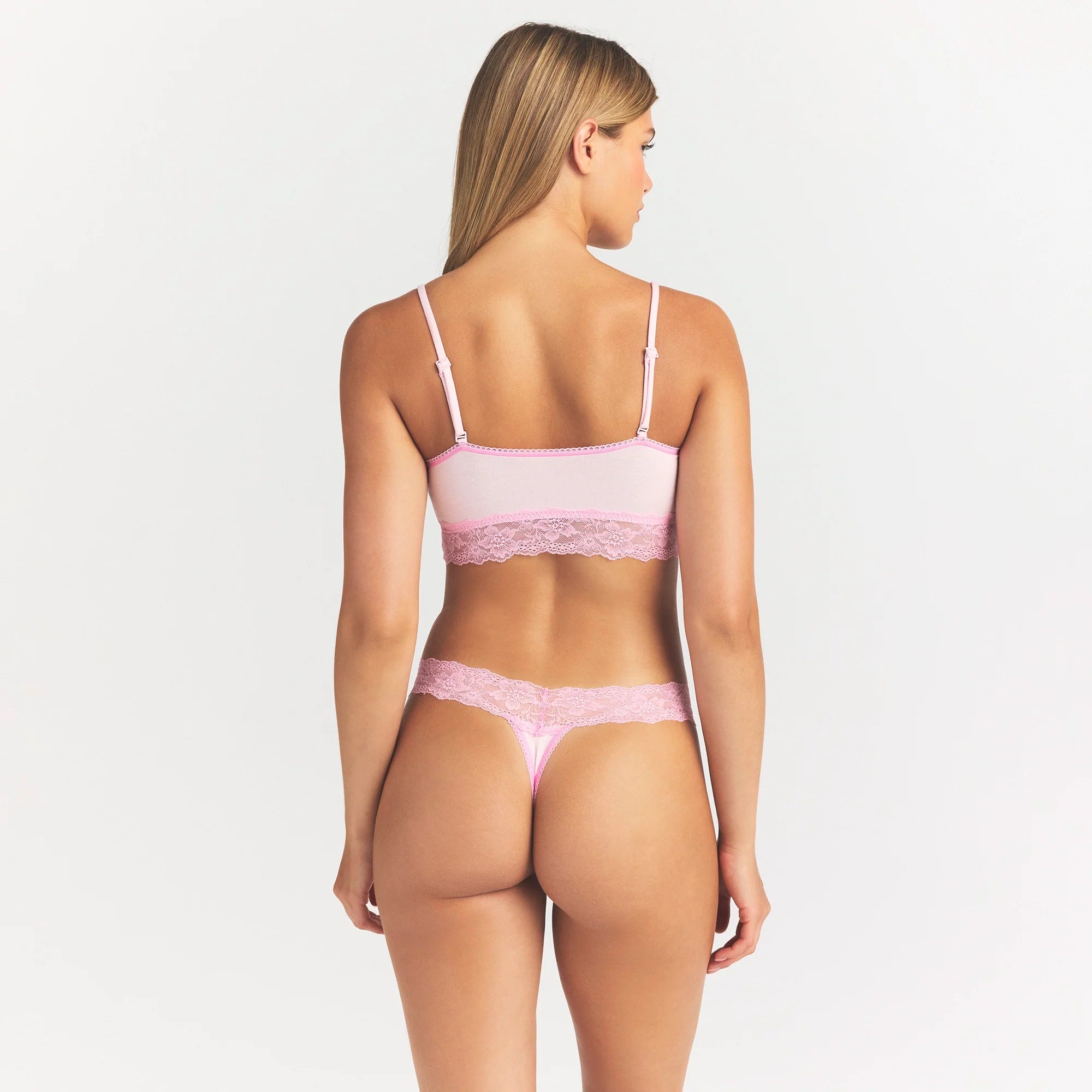 LIGHTWEIGHT COTTON WIDE LACE THONG | CHERRY BLOSSOM TONAL ON A MODEL SIDE VIEW @ | FOCUS: 0.0, 1.0, 0.9