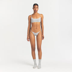 LIGHTWEIGHT COTTON POINTELLE LACE STRING THONG | LIGHT HEATHER GREY PIN DOT ON A MODEL FRONT VIEW @ | FOCUS: 0.0, 1.0, 0.9