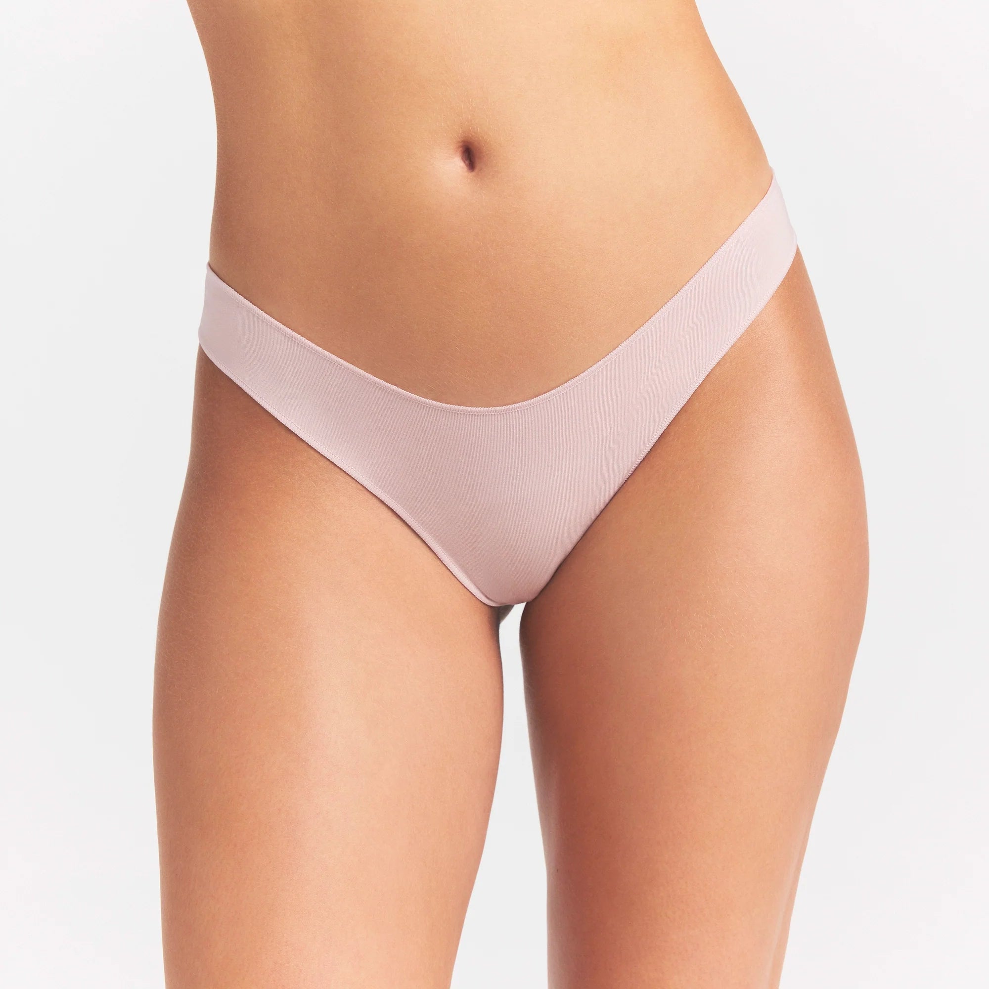 LIGHTWEIGHT COTTON THONG 10-PACK | DAINTY FLORAL MULTI ON A MODEL SIDE VIEW @ | FOCUS: 0.0, 1.0, 0.9