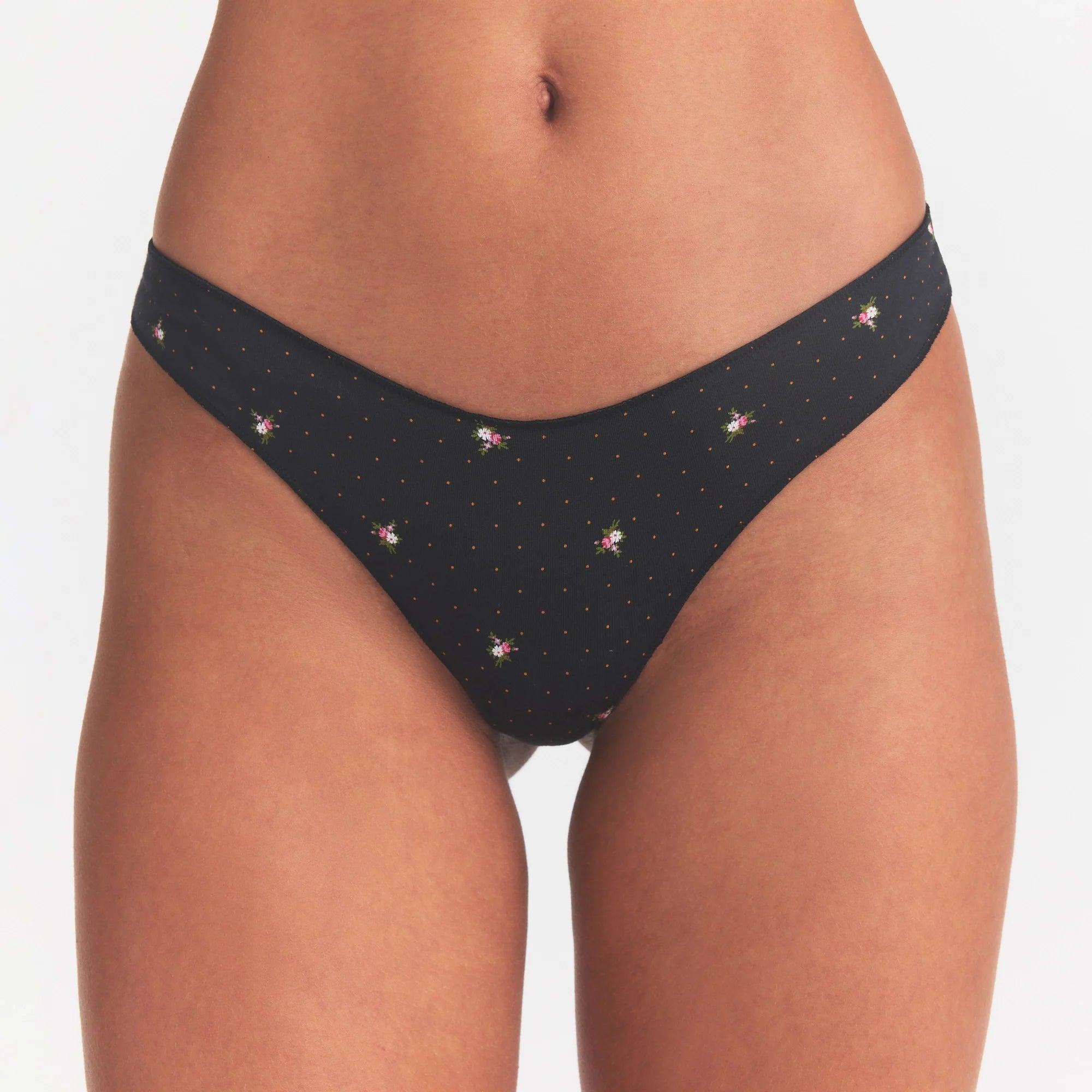 LIGHTWEIGHT COTTON THONG 10-PACK | MICRO DOT FLORAL MULTI ON A MODEL SIDE VIEW @ | FOCUS: 0.0, 1.0, 0.9