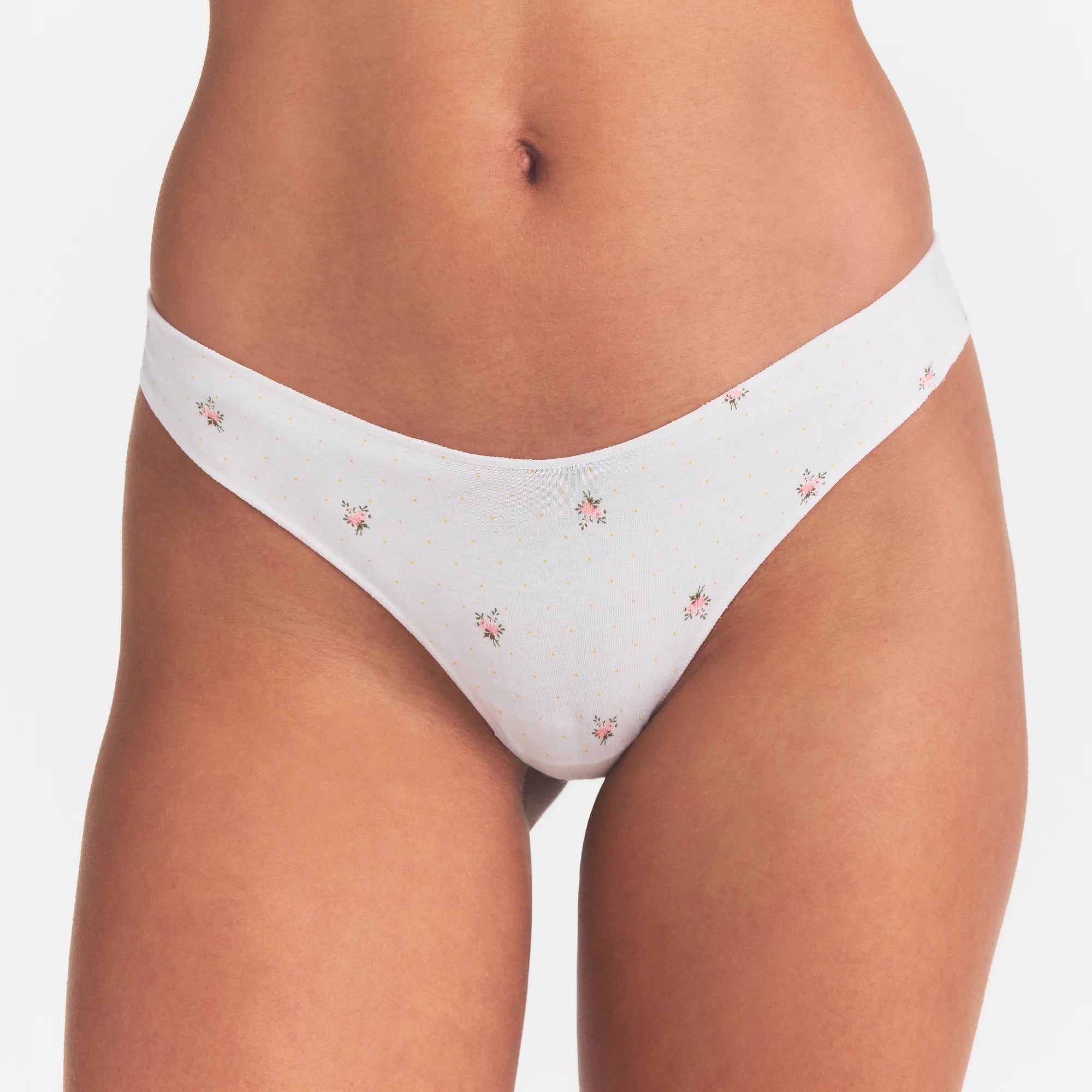 LIGHTWEIGHT COTTON THONG 10-PACK | MICRO DOT FLORAL MULTI ON A MODEL SIDE VIEW @ | FOCUS: 0.0, 1.0, 0.9