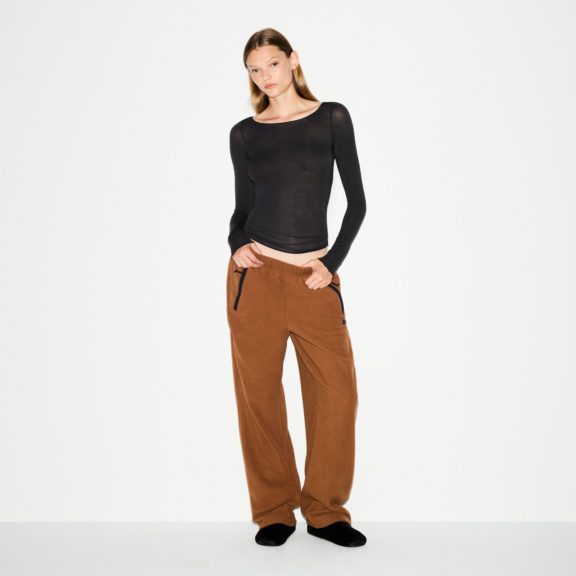 OUTDOOR FLEECE STRAIGHT LEG PANT | CHAI ON A MODEL FRONT VIEW @ | FOCUS: 0.0, 1.0, 0.9