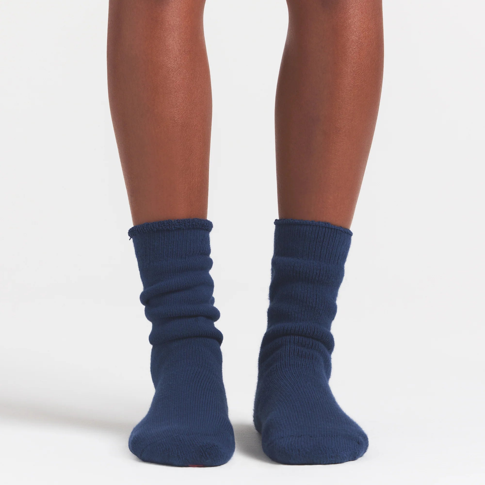 SKIMS FOR TEAM USA OLYMPIC LOUNGE SOCK | NAVYON A MODEL FRONT VIEW @ | FOCUS: 0.0, 1.0, 0.9