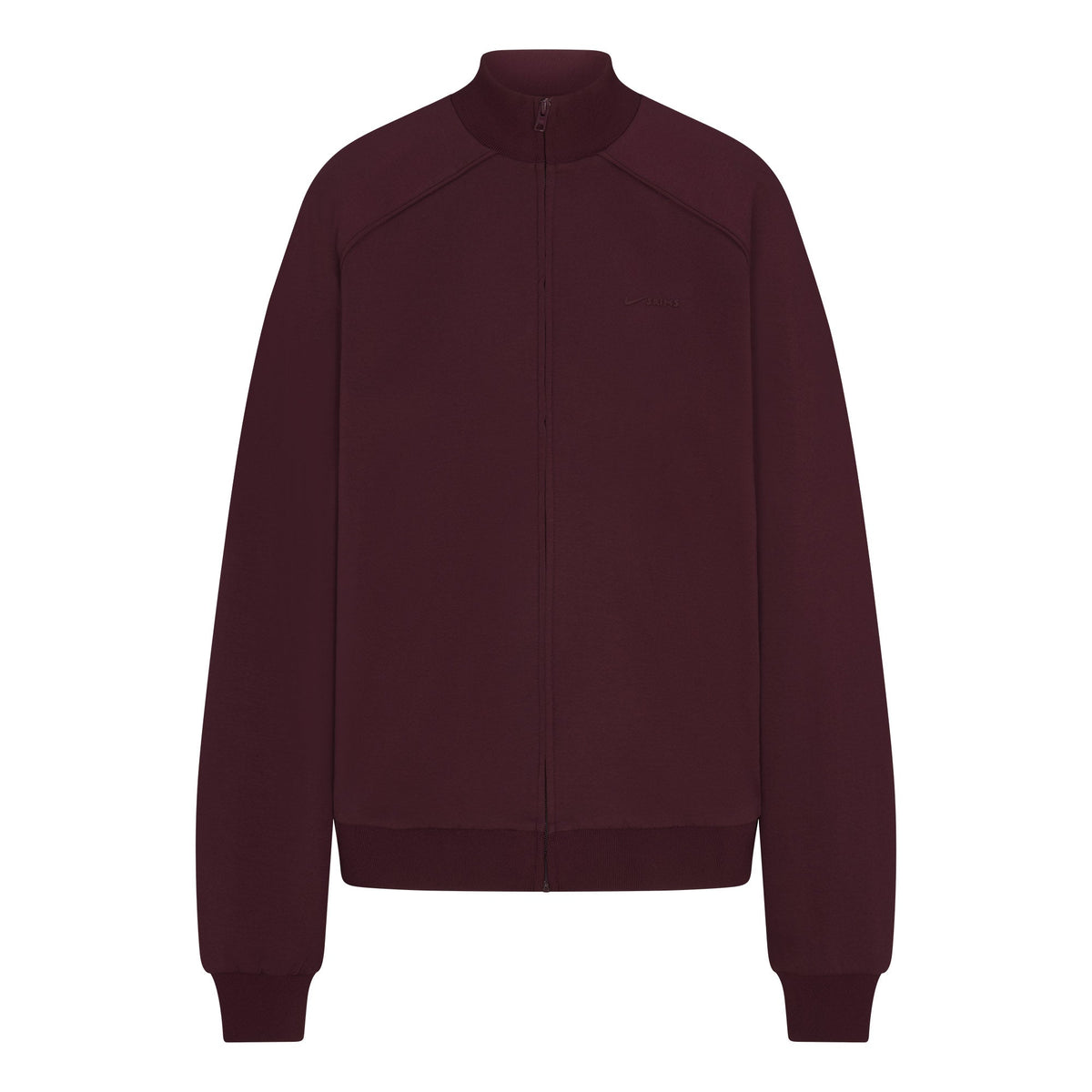 NikeSKIMS MATTE TRICOT OVERSIZED TRACK JACKET | CURRANT FLAT ON A WHITE BACKGROUND | FLT