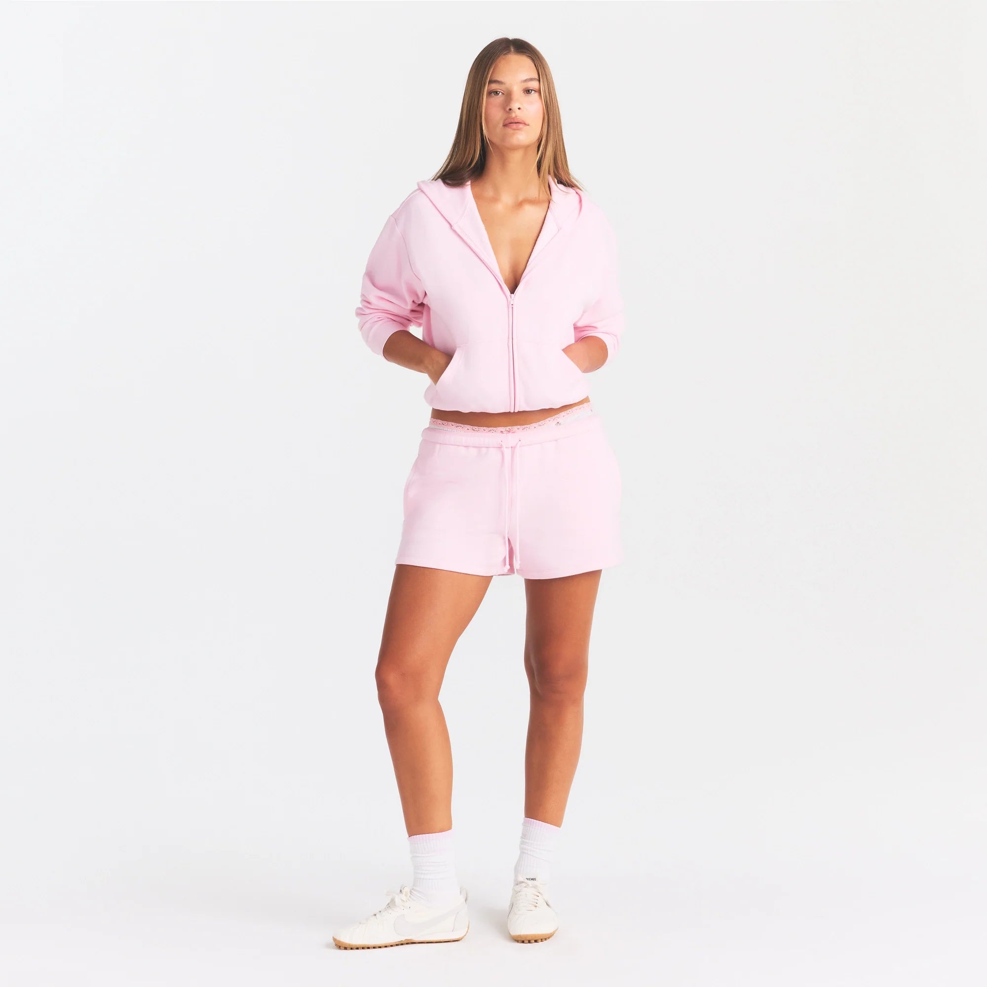 COTTON FLEECE CLASSIC ZIP UP HOODIE | CHERRY BLOSSOM ON A MODEL FRONT VIEW @ | FOCUS: 0.0, 1.0, 0.9