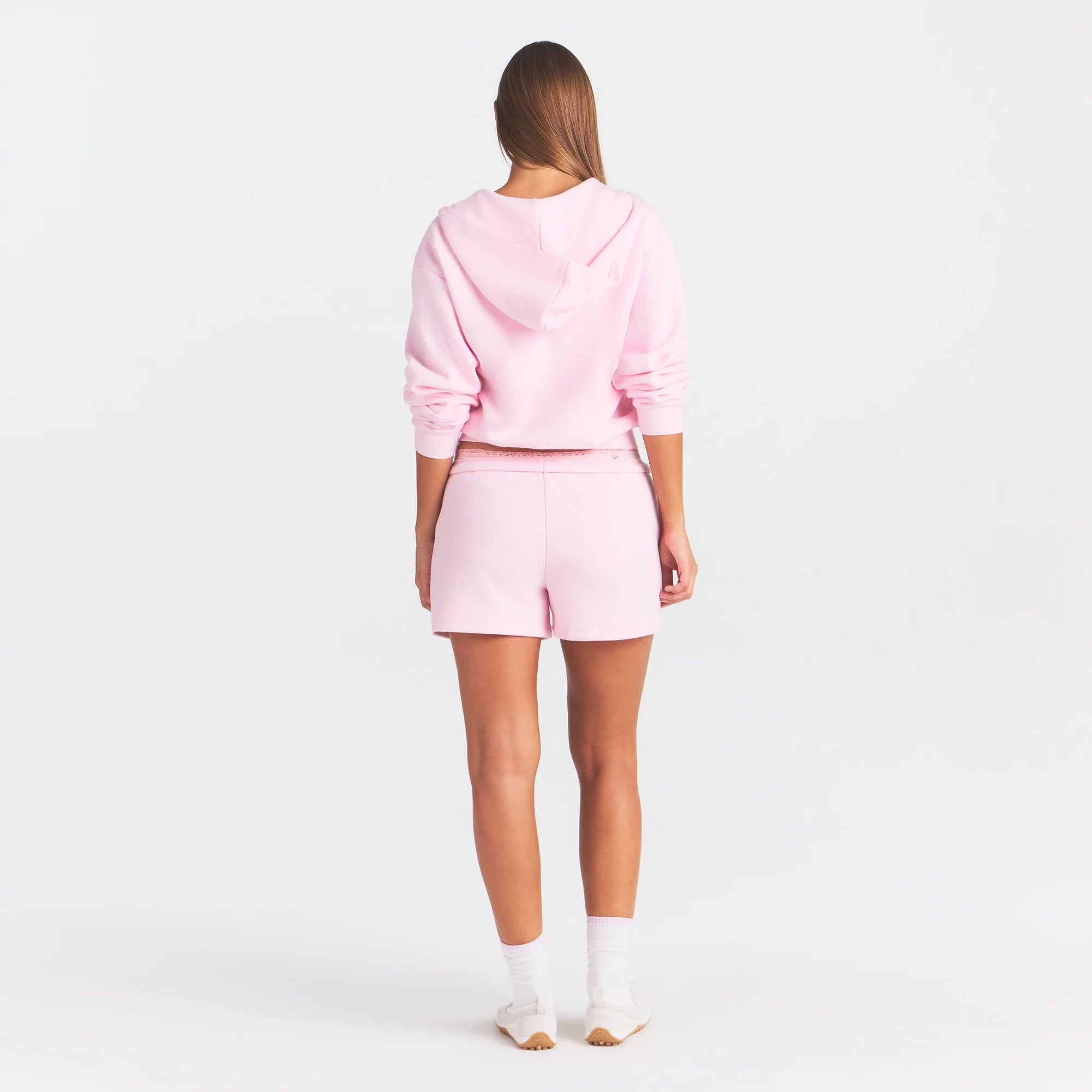 COTTON FLEECE CLASSIC ZIP UP HOODIE | CHERRY BLOSSOM ON A MODEL FRONT VIEW @ | FOCUS: 0.0, 1.0, 0.9