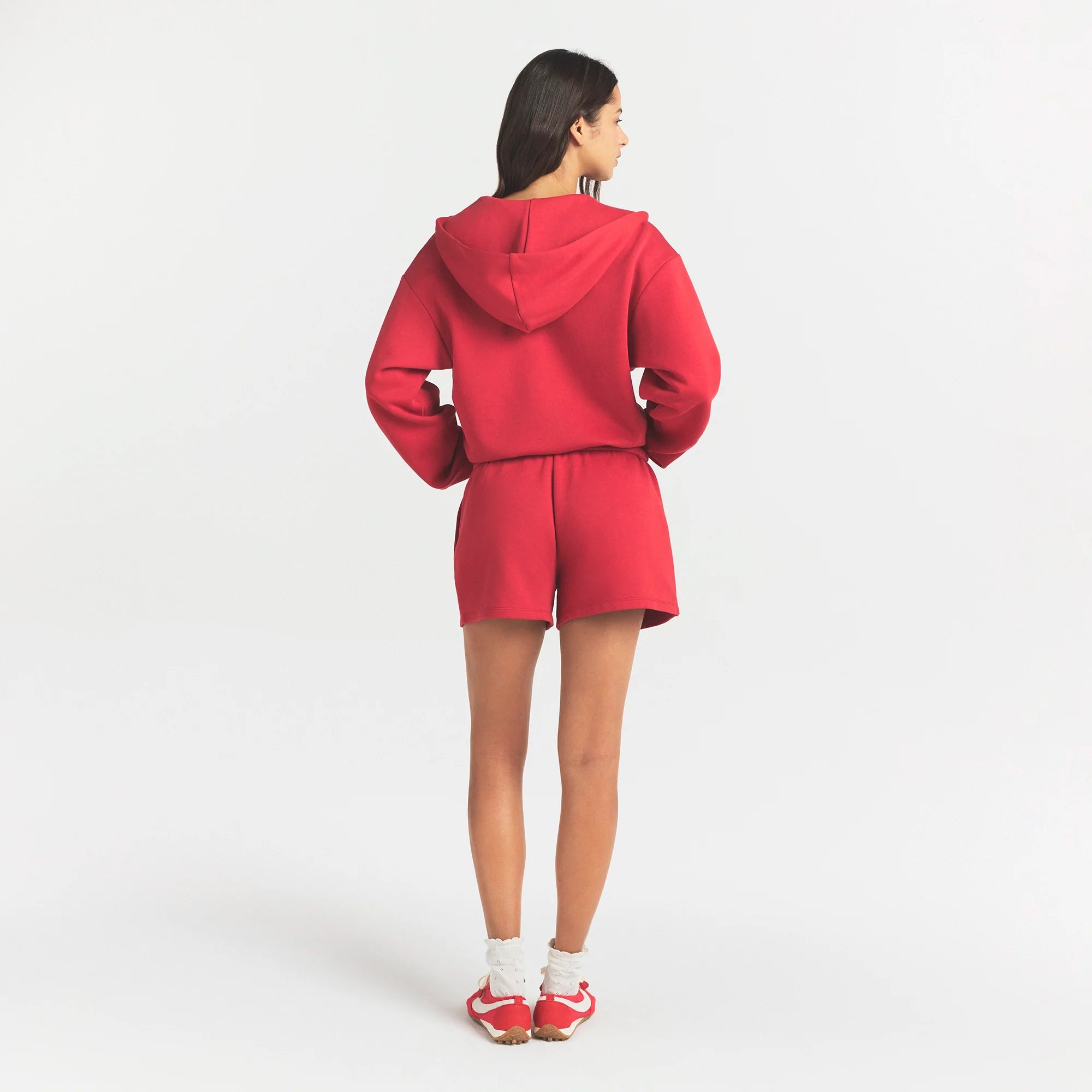 COTTON FLEECE CLASSIC ZIP UP HOODIE | WASHED RED ON A MODEL SIDE VIEW @ | FOCUS: 0.0, 1.0, 0.9