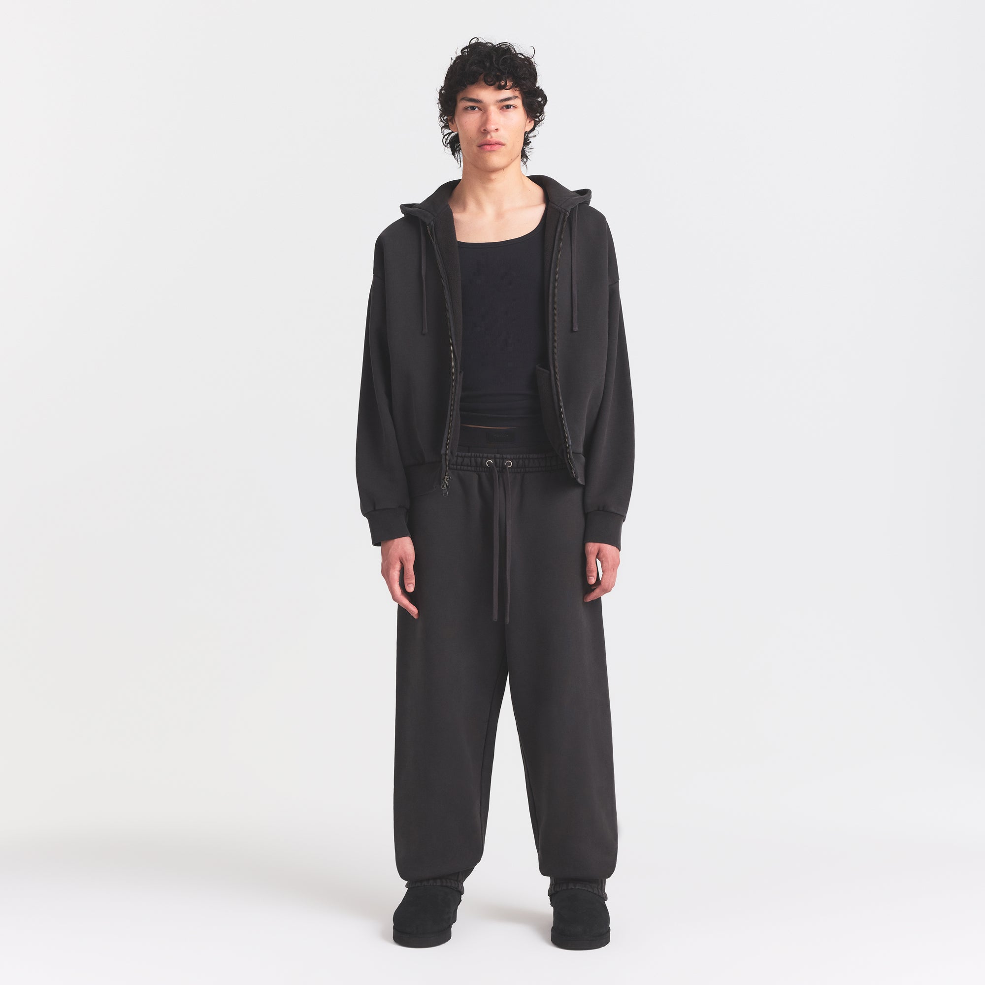 HEAVYWEIGHT FLEECE MENS ZIP UP HOODIE | WASHED ONYX ON A MODEL FRONT VIEW @ | FOCUS: 0.0, 1.0, 0.9